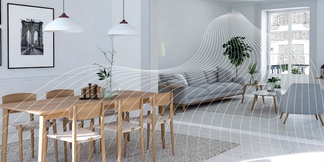 Ein Wohn-Esszimmer mit einer Lüftungsanlage ausgerüstet, die frische Luft in den Raum bringt.